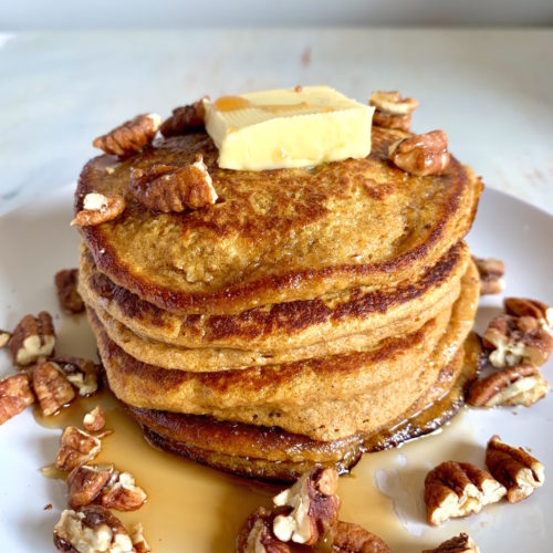 Stack of Sweet Potato Oatmeal Pancakes with butter and syrup
