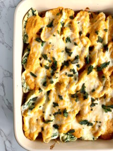 butternut squash stuffed shells in a baking dish