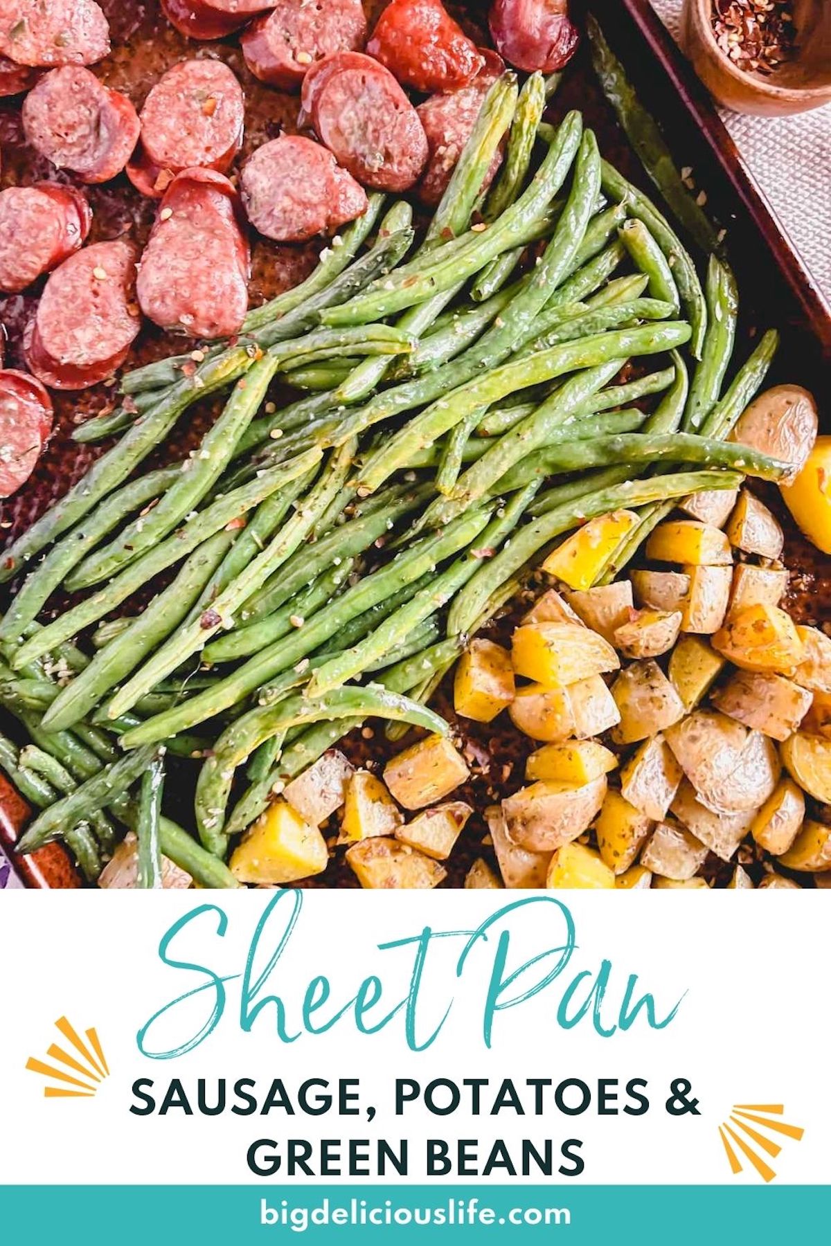 Branded Pinterest pin with photo of sheet pan sausage, potatoes and green beans.