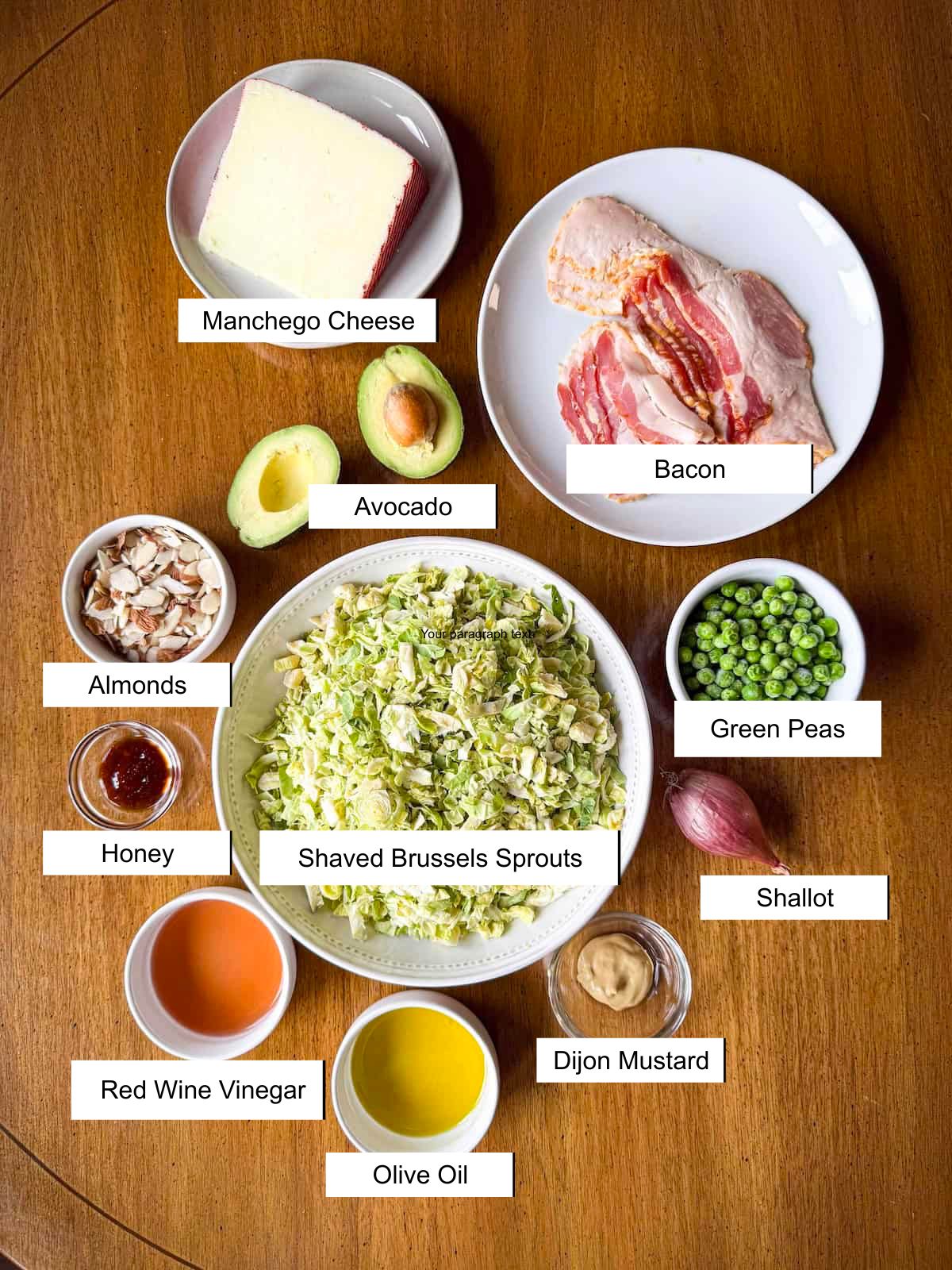 Recipe ingredients in small dishes on a wood table.