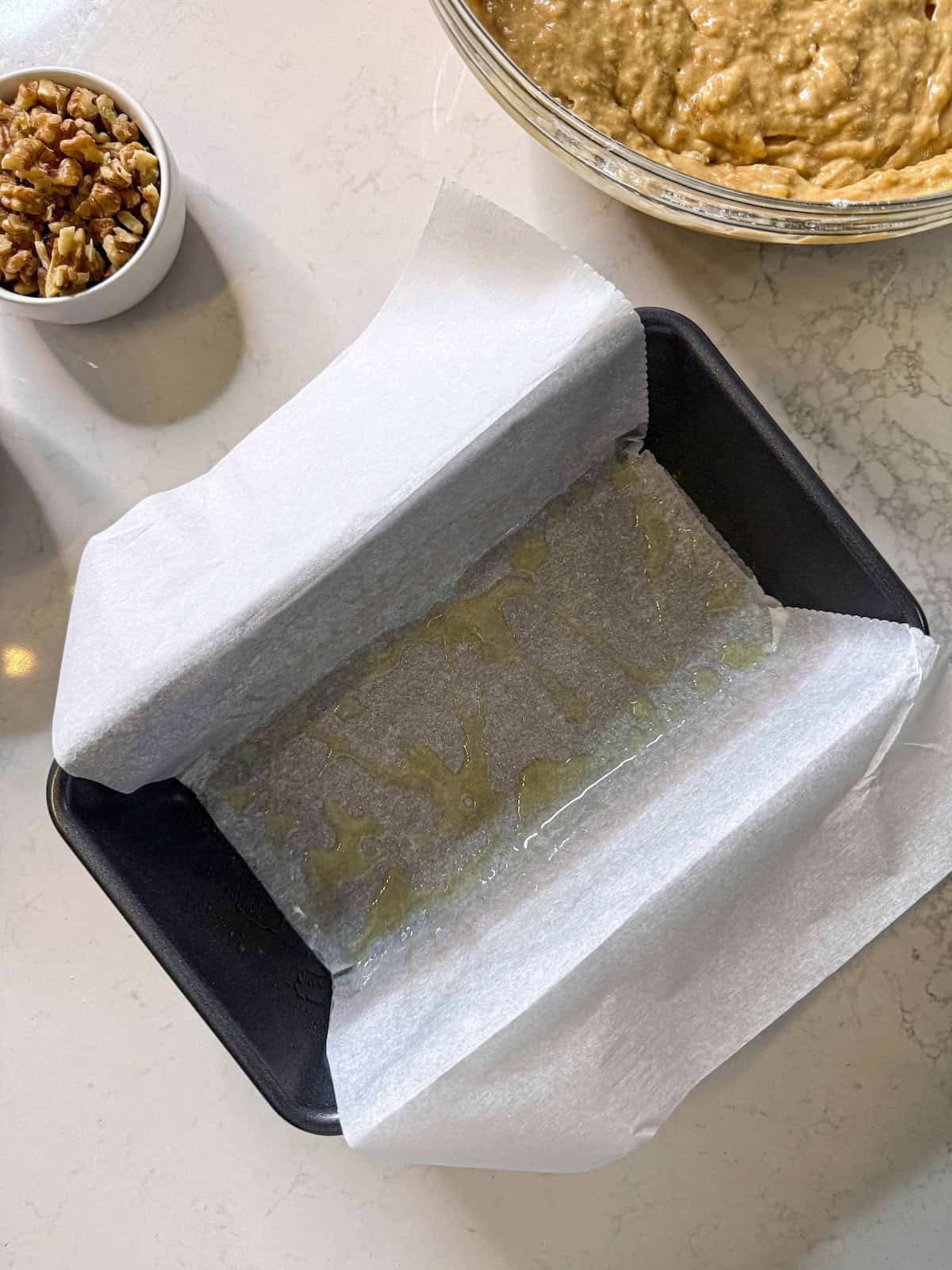 Parchment paper sling in a loaf pan.