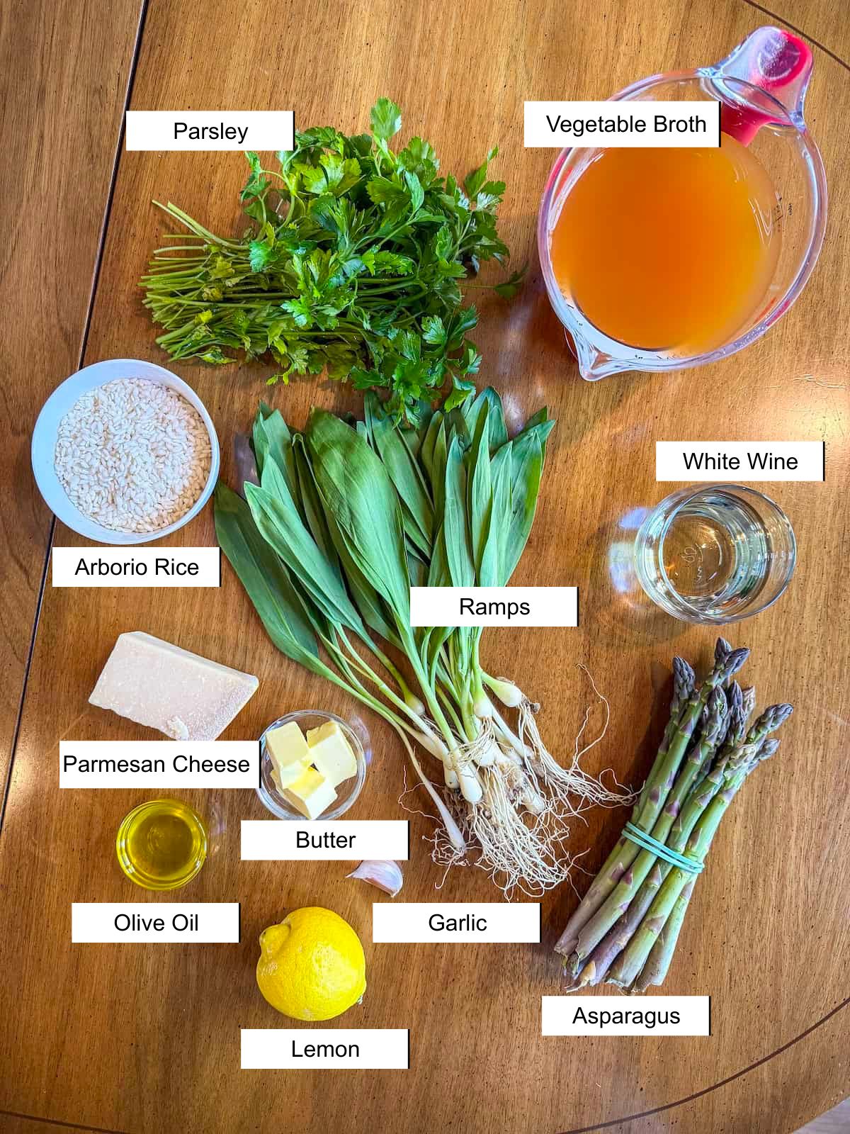 Recipe ingredients on a wood table. 