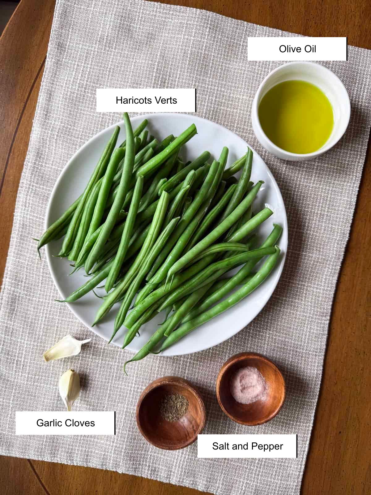 Recipe ingredients in small dishes on a placemat.