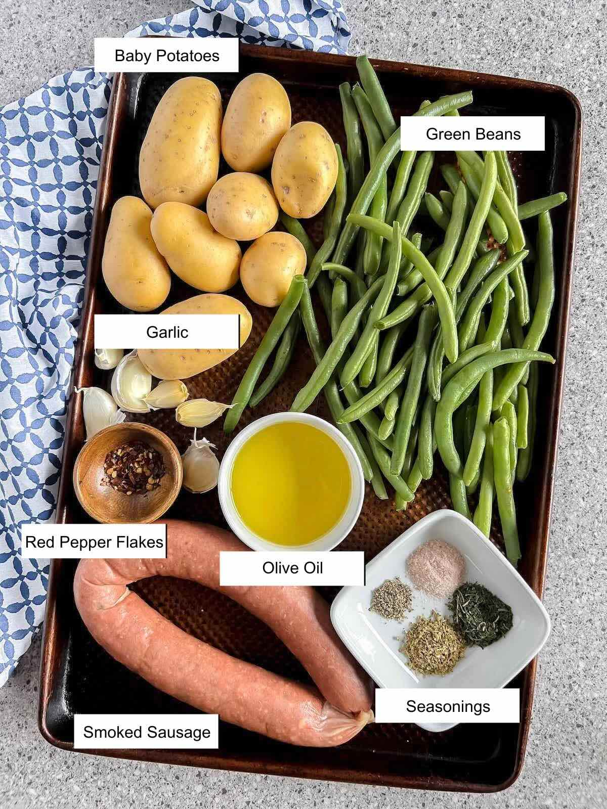 Labeled photo of recipe ingredients on a copper sheet pan.